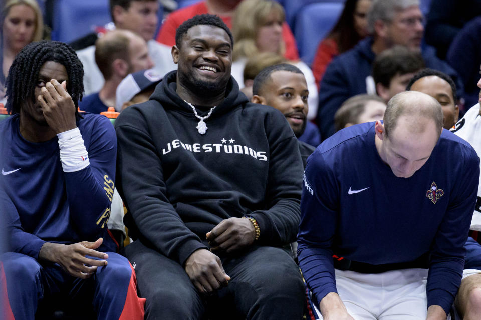 New Orleans Pelicans forward Zion Williamson, center, reacts after a Pelicans score against the Detroit Pistons during the first half of an NBA basketball game in New Orleans, Thursday, Nov. 2, 2023. (AP Photo/Matthew Hinton)