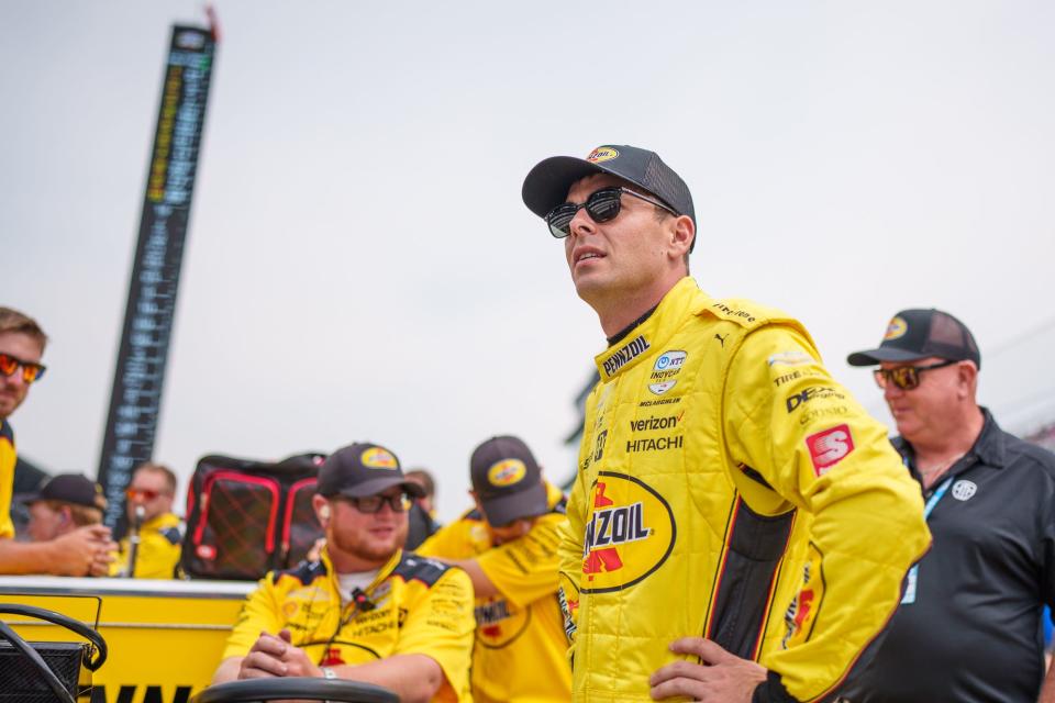 Team Penske driver Scott McLaughlin (3) prepares to get into his car Saturday, May 21, 2022, during qualifying for the 106th running of the Indianapolis 500 at Indianapolis Motor Speedway.