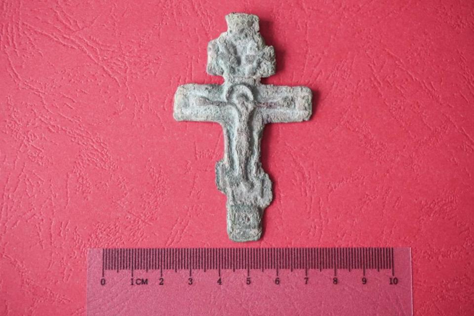 The cross, made from copper alloy, dates to either the 18th or 19th centuries, officials said.