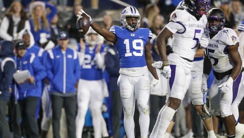 BYU’s Miles Davis signals after getting a first down while playing East Carolina during game Friday, Oct. 28, 2022, in Provo, Utah. After a brief stint in transfer portal, Miles told the Deseret News he is returning to the Cougars for the 2023-24 season.