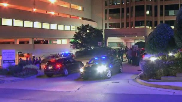 PHOTO: Authorities stand outside the hospital where the two deputies were taken on Sept. 8, 2022, after they were shot  while they were serving a warrant. The two deputies with the Cobb County Sheriff’s Office have died, according to officials. (WSB)
