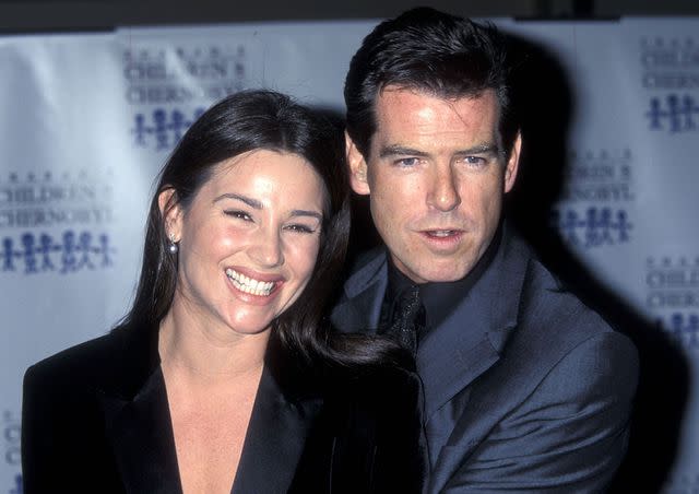 <p>Ron Galella, Ltd./Ron Galella Collection via Getty</p> Keely Shaye Smith and Pierce Brosnan in 1998