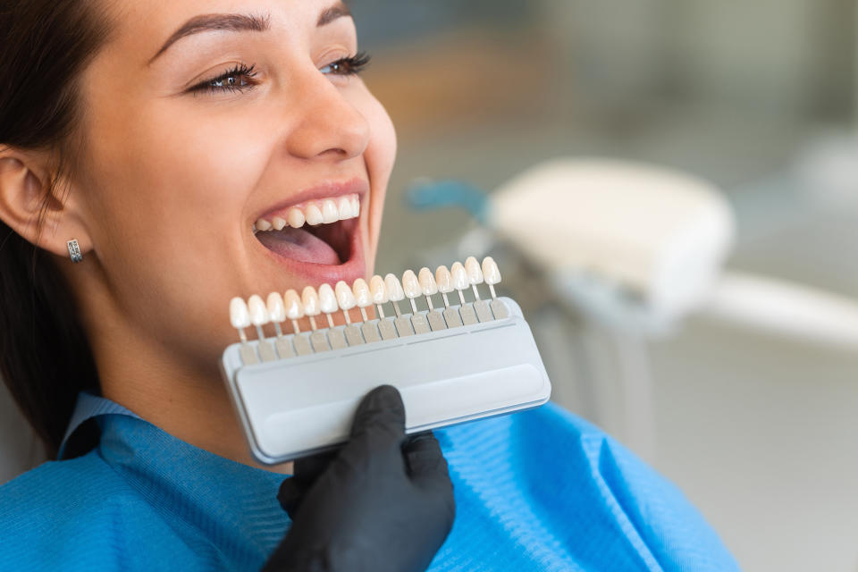 Services like teeth whitening, mouth guards and implants won't be covered by the Canadian Dental Care Plan. (Photo via Getty Imags)