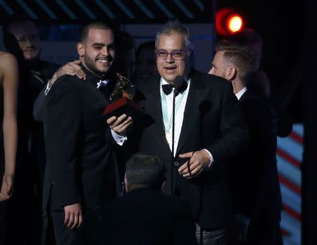 Producer Gustavo Farias accepts the award for album of the year for "Los Duo 2" by Juan Gabriel at the 17th Annual Latin Grammy Awards in Las Vegas, Nevada, U.S., November 17, 2016. REUTERS/Mario Anzuoni