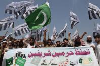 Pakistani activists from the banned organisation Jamaat-ud-Dawa (JuD) shout slogans during a rally in support of the government of Saudi Arabia over the conflict in Yemen in Peshawar on April 17, 2015