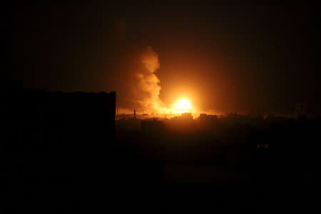 Smoke billows from a fire at a Houthi-controlled military site after it was hit by a Saudi-led air strike in Sanaa, Yemen, June 3, 2015. REUTERS/Mohamed al-Sayaghi