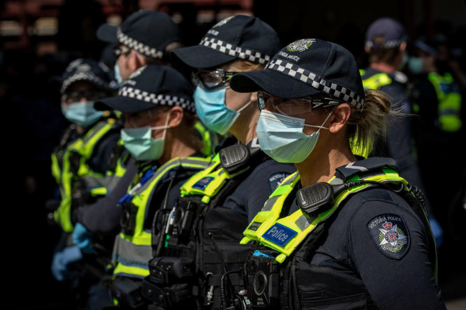 Police at anti-lockdown protests, September 11, 2020 in Melbourne, Australia. (Photo by Darrian Traynor)