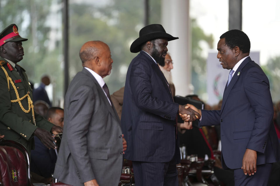 South Sudan's President Salva Kiir Mayardit, left, shakes hands with Zambian President Hakainde Hichilema, during the launch of high-level peace talks for South Sudan at State House in Nairobi, Kenya, on Thursday, May 9, 2024. High-level mediation talks on South Sudan were launched in Kenya with African presidents in attendance calling for an end to a conflict that has crippled the country's economy for years. (AP Photo/Brian Inganga)