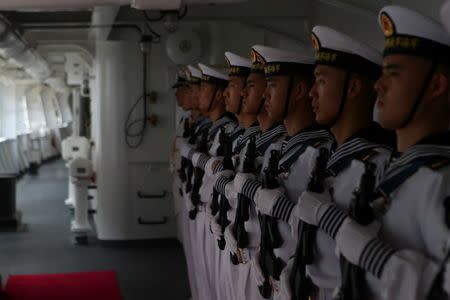 Members of the Chinese People Liberation Army Navy stand at the China's People's Liberation Army (PLA) Navy hospital ship Peace Ark, during its arrival ceremony at the port in La Guaira, Venezuela September 22, 2018. REUTERS/Manaure Quintero