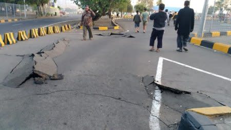 A crack emerges on a road at Kayangan Port after an earthquake hit Lombok, Indonesia, August 20, 2018, in this picture obtained from social media. Bayu Wiguna/via REUTERS