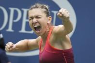 Simona Halep of Romania celebrates after defeating Victoria Azarenka of Belarus in their quarterfinals match at the U.S. Open Championships tennis tournament in New York, September 9, 2015. REUTERS/Carlo Allegri