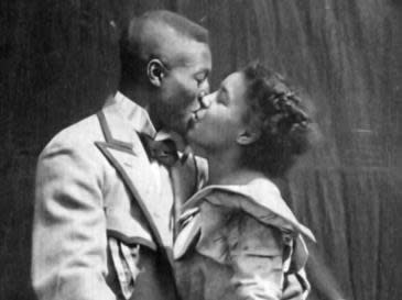 Saint Suttle and Gertie Brown embrace in the 1898 film 