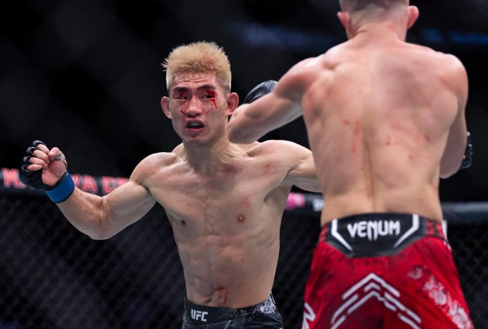 Peter Yan of Russia fights against Song Yadong of Chian during their bantamweight title match during the UFC 299 event at the Kaseya Center on Saturday, March 9, 2024, in downtown Miami, Fla. MATIAS J. OCNER/mocner@miamiherald.com