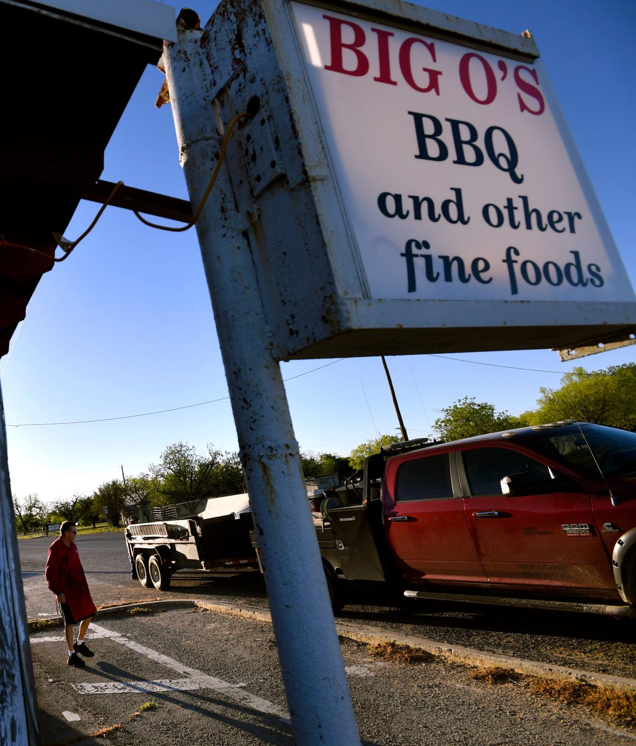Lynn Owens steps outside to check on a pickup improperly parked in front of his restaurant on U.S. 67 in Valera April 19, 2018.