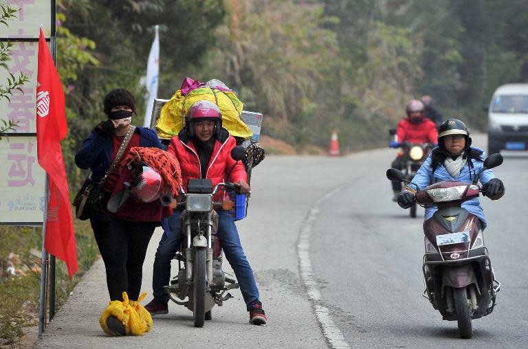 A group of Chinese travellers on their motorcycles at a pitstop in Wuzhou, Guangxi province, on January 25, 2014