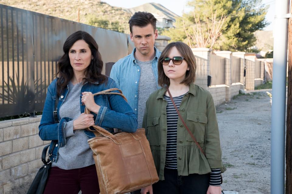 Michaela Watkins, Tommy Dewey, and Tara Lynne Barr walking together