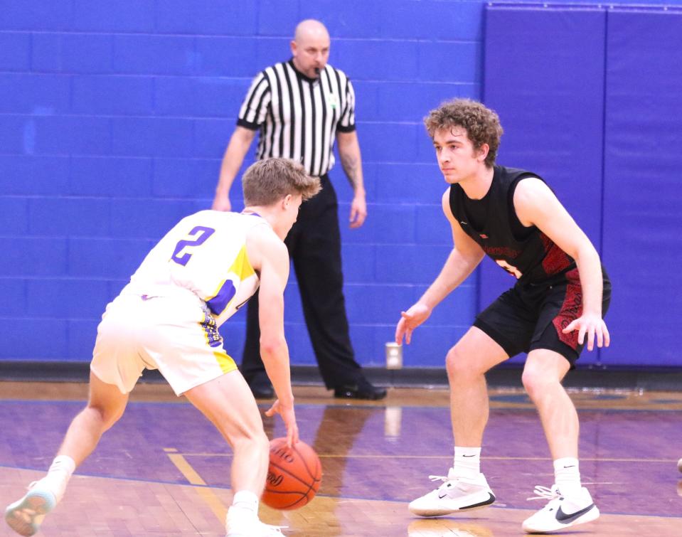 Rosecrans' Brendan Bernath guards Steubenville Catholic Central's Benji Rook in Friday's Division IV sectional final.