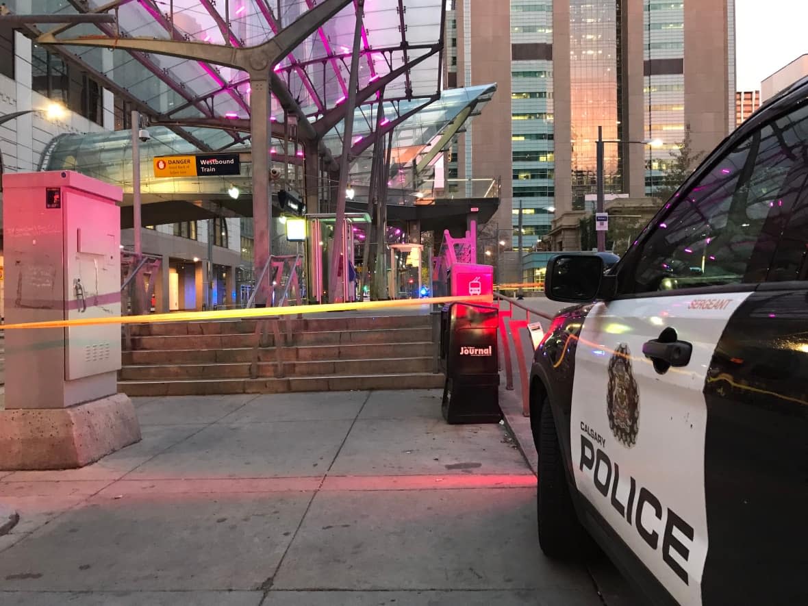 Police cordoned off the CTrain station at Fourth Street in the downtown core and LRT service was suspended after four people were attacked early Friday morning.  (Dave Gilson/CBC - image credit)