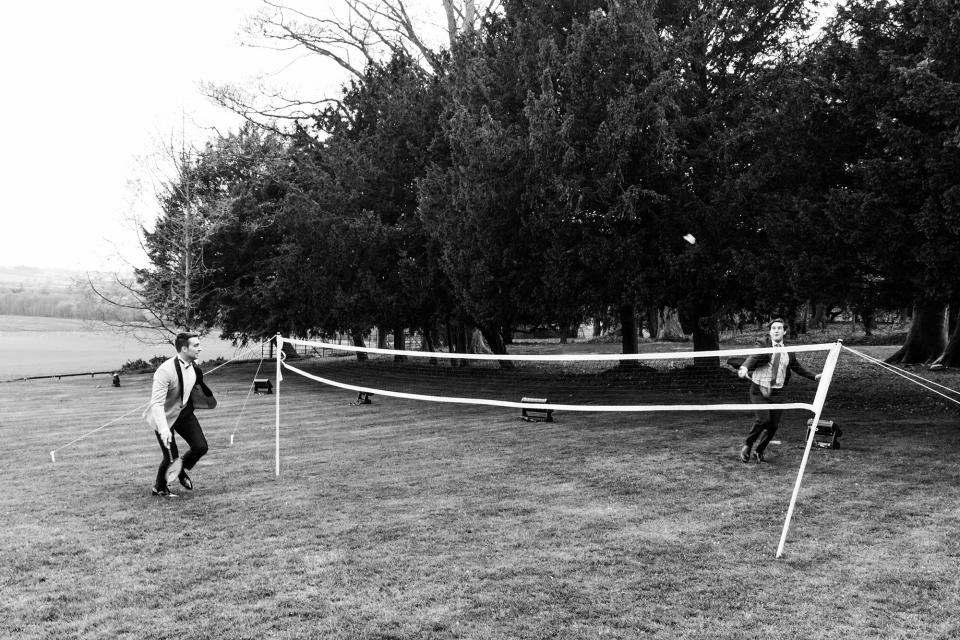 There was badminton set up on the back lawn for the cocktail reception. Here are Johnny and Pat putting it to use!