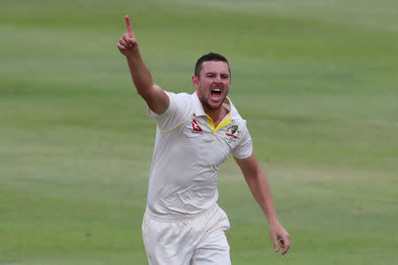 Cricket - South Africa vs Australia - Third Test - Newlands, Cape Town, South Africa - March 24, 2018 Australia's Josh Hazlewood celebrates taking the wicket of South Africa's Temba Bavuma REUTERS/Mike Hutchings