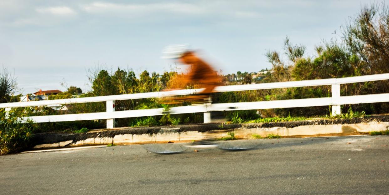 cyclist headed downhill on enchanted way