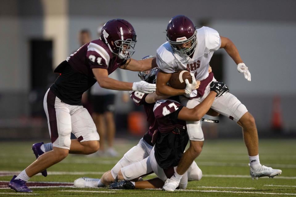 Photos from the First Baptist Academy football practice and intrasquad scrimmage, Friday, Aug. 12, 2022, at First Baptist Academy in Naples, Fla.