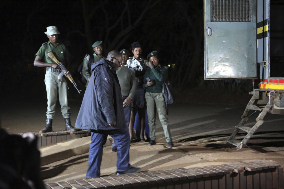 Zimbabwean opposition official TendaI Biti leaves the magistrates courts after been granted bail in Harare, Thursday, Aug, 9, 2018. Biti was charged with inciting public violence and declaring unofficial results as fears grow about a government crackdown following the disputed July 30 election, raising concerns about a wave of repression against the opposition by the government of Zimbabwe's President Emmerson Mnangagwa.(AP Photo/Tsvangirayi Mukwazhi)