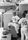 New manager Tommy Lasorda looks over his domain from the dugout as his Los Angeles Dodgers downed the San Francisco Giants in Los Angeles on Thursday, April 8, 1977. It was 5-1. It was Lasorda's first game as a major league skipper. (AP Photo)