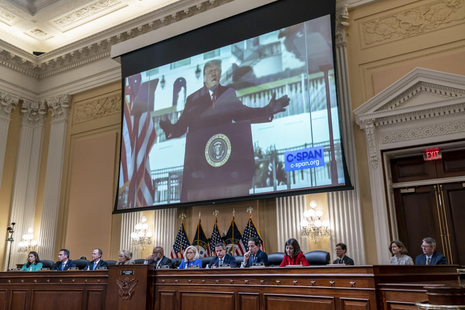 A video of former President Donald Trump speaking during a rally near the White House on Jan. 6, 2021, is shown as committee members from left to right, Rep. Stephanie Murphy, D-Fla., Rep. Pete Aguilar, D-Calif., Rep. Adam Schiff, D-Calif., Rep. Zoe Lofgren, D-Calif., Chairman Bennie Thompson, D-Miss., Vice Chair Liz Cheney, R-Wyo., Rep. Adam Kinzinger, R-Ill., Rep. Jamie Raskin, D-Md., and Rep. Elaine Luria, D-Va., look on, as the House select committee investigating the Jan. 6 attack on the U.S. Capitol holds its first public hearing to reveal the findings of a year-long investigation, at the Capitol in Washington, Thursday, June 9, 2022. (AP Photo/J. Scott Applewhite)