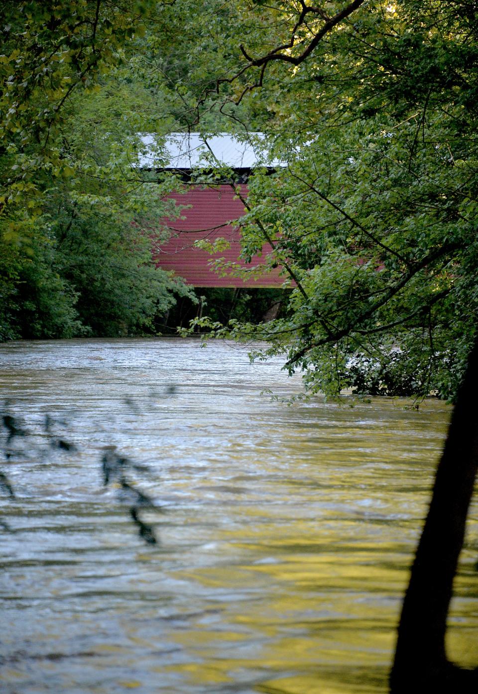 The Greencastle-Antrim area received nearly 4.5 inches of rain from Hurricane Ida on Sept. 1, 2021, and the east branch of the Conococheague Creek was high under Martin's Mill Bridge in Antrim Township and spilled across the adjacent park, but didn’t cause any damage. If Hurricane Ian brings 2 inches of rain to the region, it’s possible the road to the park will flood and the park will be closed for a couple of days early next week.