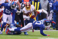 <p>Darian Thompson #27 of the New York Giants tackles Keith Marshall #39 of the Washington Redskins during the second half at MetLife Stadium on December 31, 2017 in East Rutherford, New Jersey. The Giants defeated the Redskins 18-10. (Photo by Ed Mulholland/Getty Images) </p>