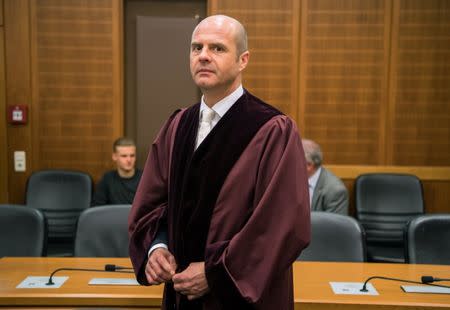 Senior Public Prosecutor Lienhard Weiss arrives for the start of the espionage trial of defendant Swiss man Daniel M., who is accused of spying on a German tax authority to find out how it obtained details of secret Swiss bank accounts set up by Germans to avoid tax, at the Higher Regional Court in Frankfurt am Main, Germany October 18, 2017. REUTERS Andreas Arnold/Pool