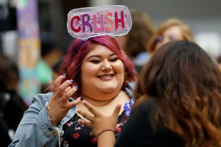 Attendees and K-pop fans participate at KCON USA, billed as the world's largest Korean culture convention and music festival, in Los Angeles, California, U.S. August 10, 2018.Picture taken on August 10, 2018. REUTERS/Mike Blake