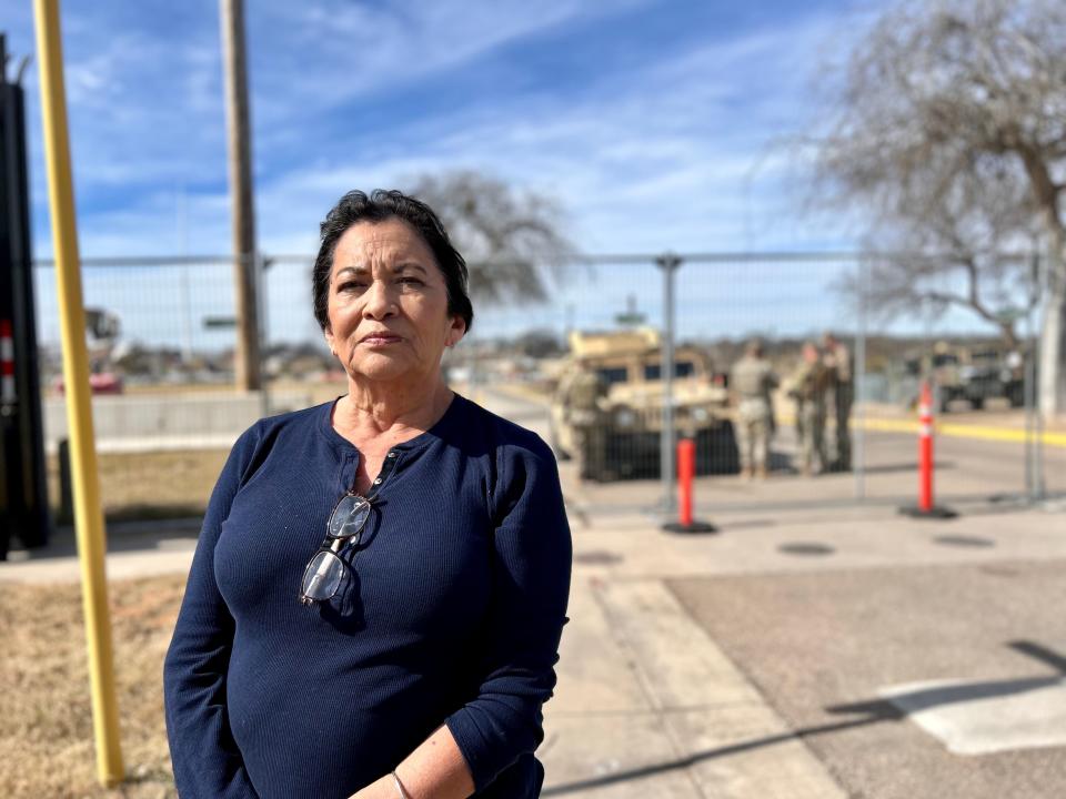 Juanita Martinez, 67, stands in Eagle Pass outside Shelby Park, which has been taken over by Texas National Guard troops to stem the flow of undocumented migrants. Martinez opposes the closing of the park and other state border tactics, including razor wire.