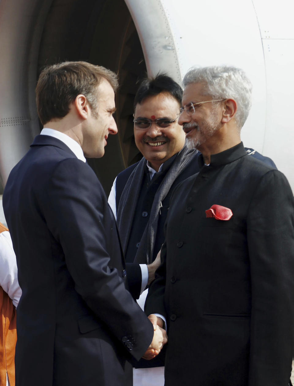 This photograph shared by the Indian Ministry of External Affairs on the social media platform X, formerly known as Twitter shows, Indian Foreign Minister S.Jaishankar, right, welcoming French President Emmanuel Macron, left upon his arrival in Jaipur, Rajasthan, India, Thursday, Jan.25, 2024. (Indian Foreign Ministry twitter handle via AP)