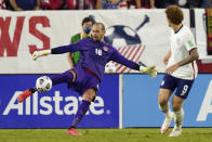Canada goalkeeper Milan Borjan (18) kicks the ball away from United States forward Josh Sargent (9) during the second half of a World Cup soccer qualifier Sunday, Sept. 5, 2021, in Nashville, Tenn. (AP Photo/Mark Humphrey)