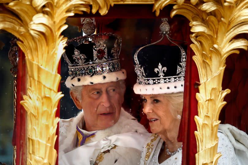 King Charles III and Queen Camilla travelling in the Gold State Coach built in 1760 and used at every Coronation since that of William IV in 1831 -Credit:Getty Images