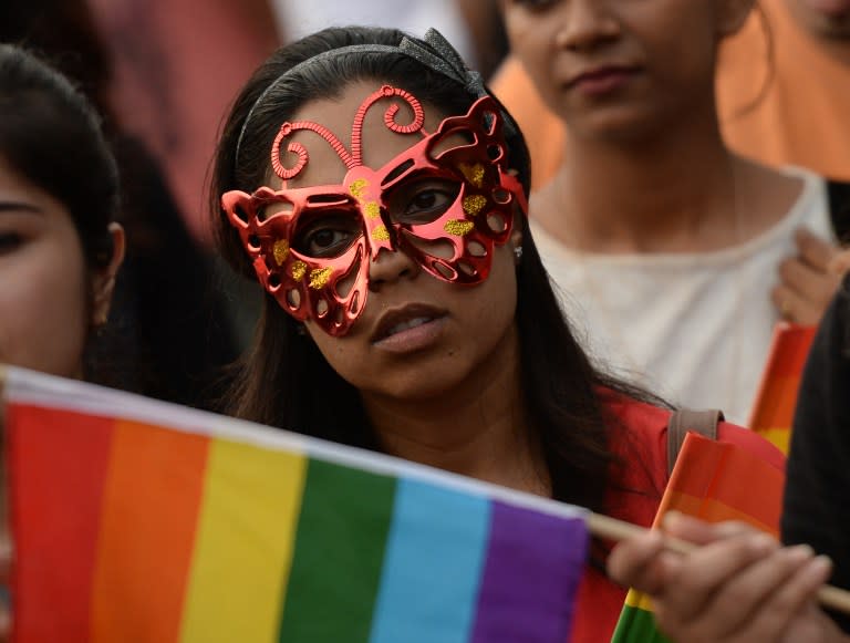 <p>Indian activists of the LGBT (Lesbian, Gay, Bisexual, Transgender) community take part in a pride parade calling for freedom from discrimination on the grounds of sexual orientation, in Gurugram, some 30 km southwest of New Delhi, on June 25, 2016. </p>