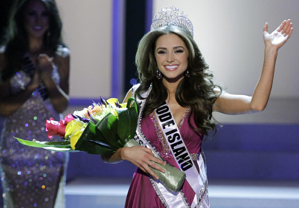 Miss Rhode Island Olivia Culpo waves to the audience after being crowned Miss USA during the 2012 Miss USA pageant, Sunday, June 3, 2012, in Las Vegas. (AP Photo/Julie Jacobson)