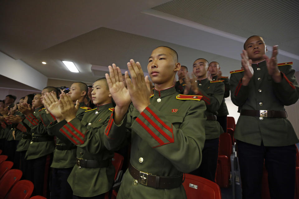 North Koreans military cadets attend an evening gala held on the eve of the 70th anniversary of North Korea's founding day in Pyongyang, North Korea, Saturday, Sept. 8, 2018. North Korea will be staging a major military parade, huge rallies and reviving its iconic mass games on Sunday to mark its 70th anniversary as a nation. (AP Photo/Kin Cheung)