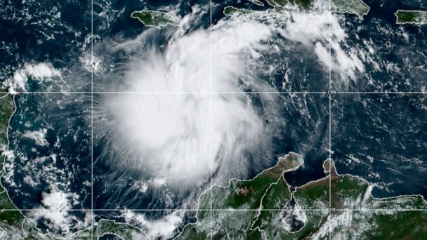 PHOTO: This satellite image provided by the National Oceanic and Atmospheric Administration shows Tropical Storm Ian over the central Caribbean, on Sept. 24, 2022. (NOAA via AP)