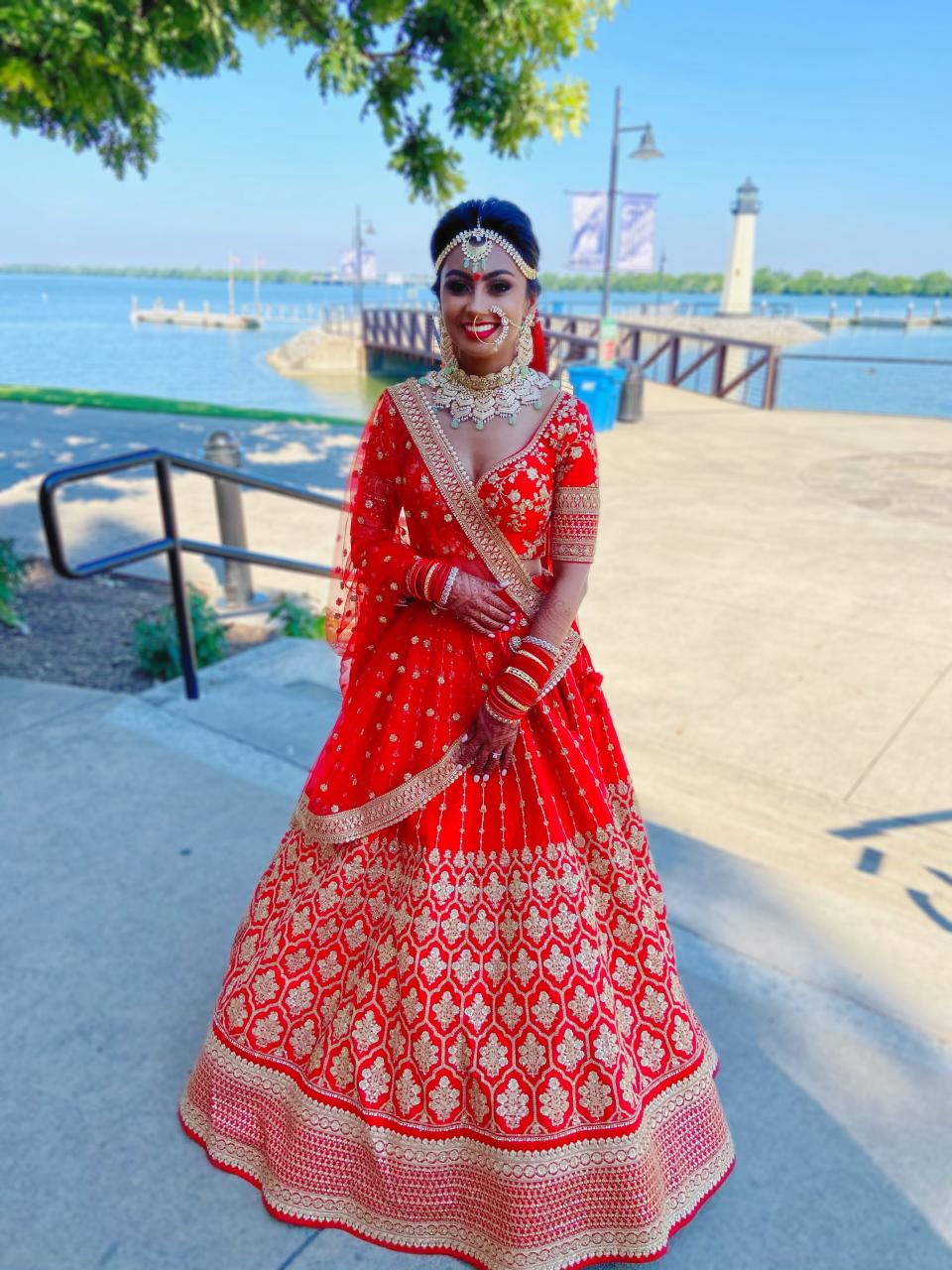 Tripathi in a red lehenga on her wedding day.