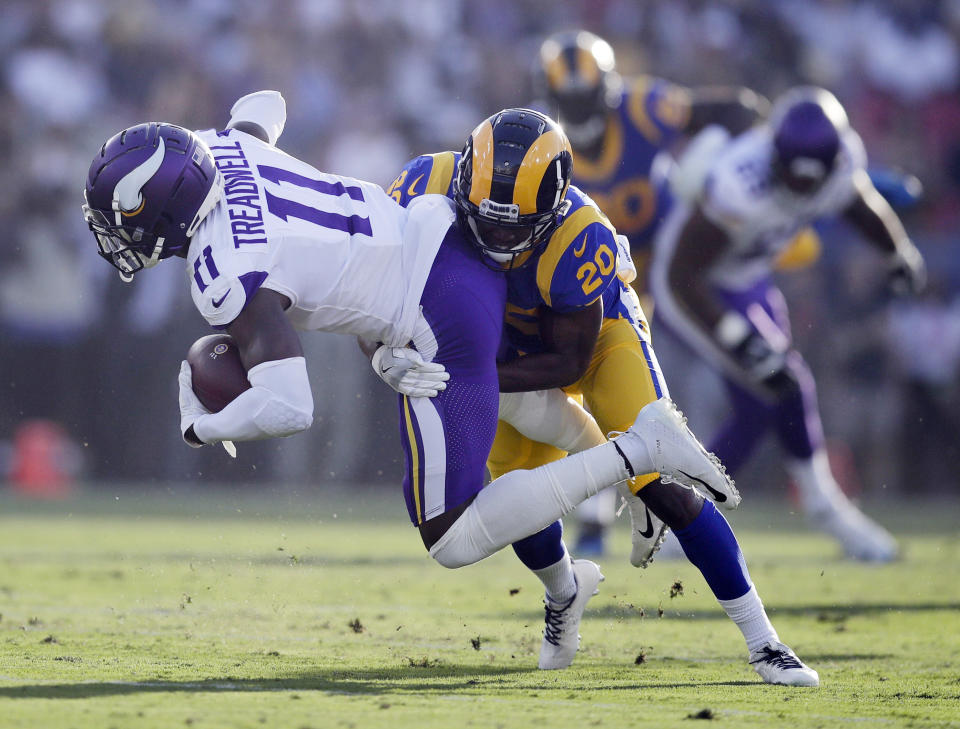 FILE - In this Sept. 27, 2018, file photo, Minnesota Vikings wide receiver Laquon Treadwell (11) is tackled by Los Angeles Rams defensive back Lamarcus Joyner during the first half in an NFL football game in Los Angeles. The Oakland Raiders have agreed to a four-year contract with free agent safety Lamarcus Joyner. A person familiar with the deal said Tuesday, March 12, 2019, on condition of anonymity, that Joyner will sign the contract after the start of the new league year. The person spoke on condition of anonymity because the move can't be finalized until Wednesday. (AP Photo/Jae C. Hong, File)