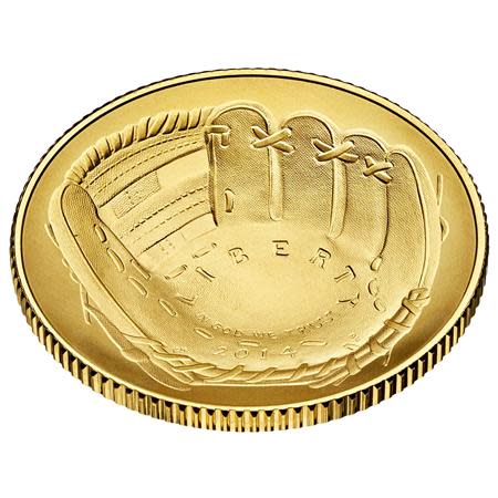 An image of a baseball mitt is seen on a curved $5 gold National Baseball Hall of Fame Commemorative Coin, in a picture made available by the U.S. Mint on March 13, 2014. REUTERS/John Burwell/U.S. Mint/Handout via Reuters