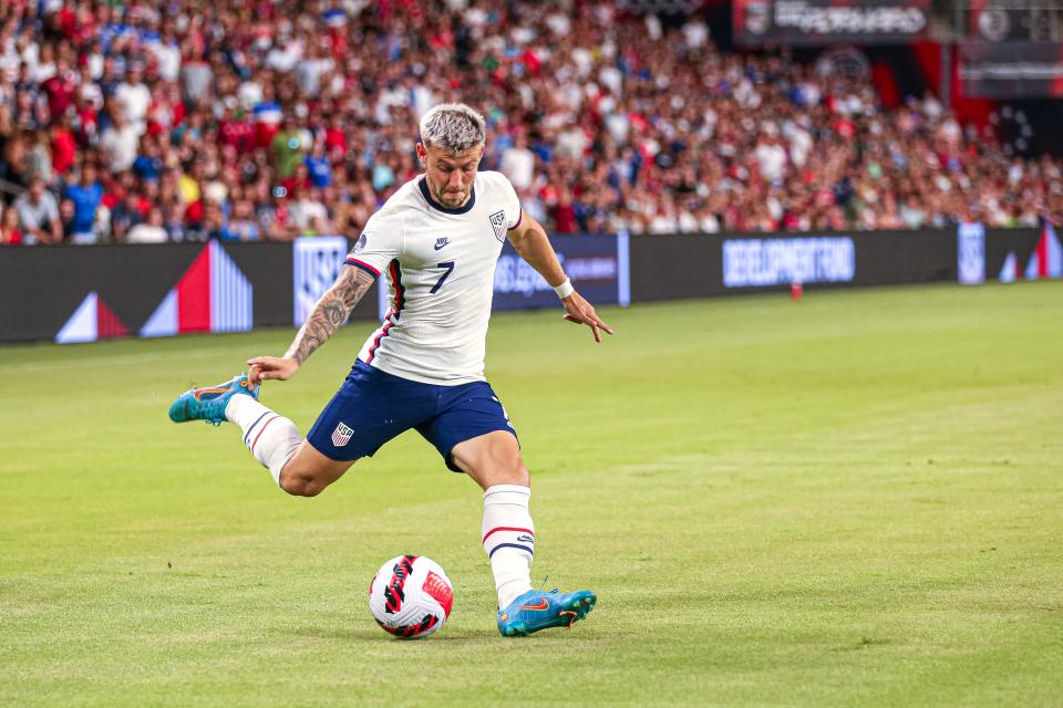 United States forward Paul Arriola (7) shoots the ball during the match against Grenada at Q2 Stadium in Austin, Texas on June 10, 2022.