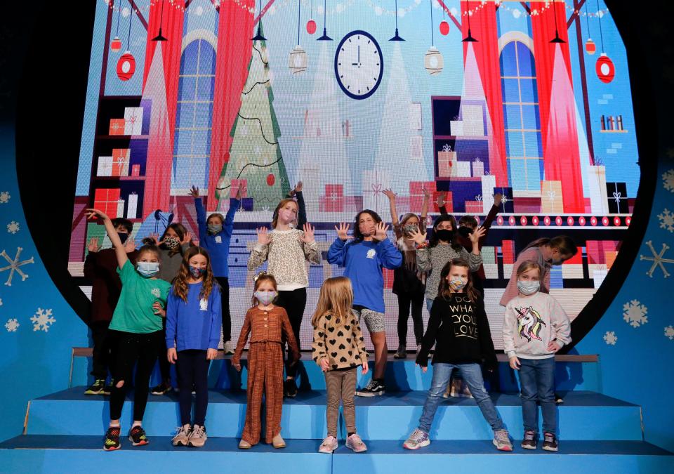 Actors with the Tuscaloosa Children's Theatre perform during rehearsal for Elf Jr. at the Bama Theatre Monday, Nov. 29, 2021. [Staff Photo/Gary Cosby Jr]