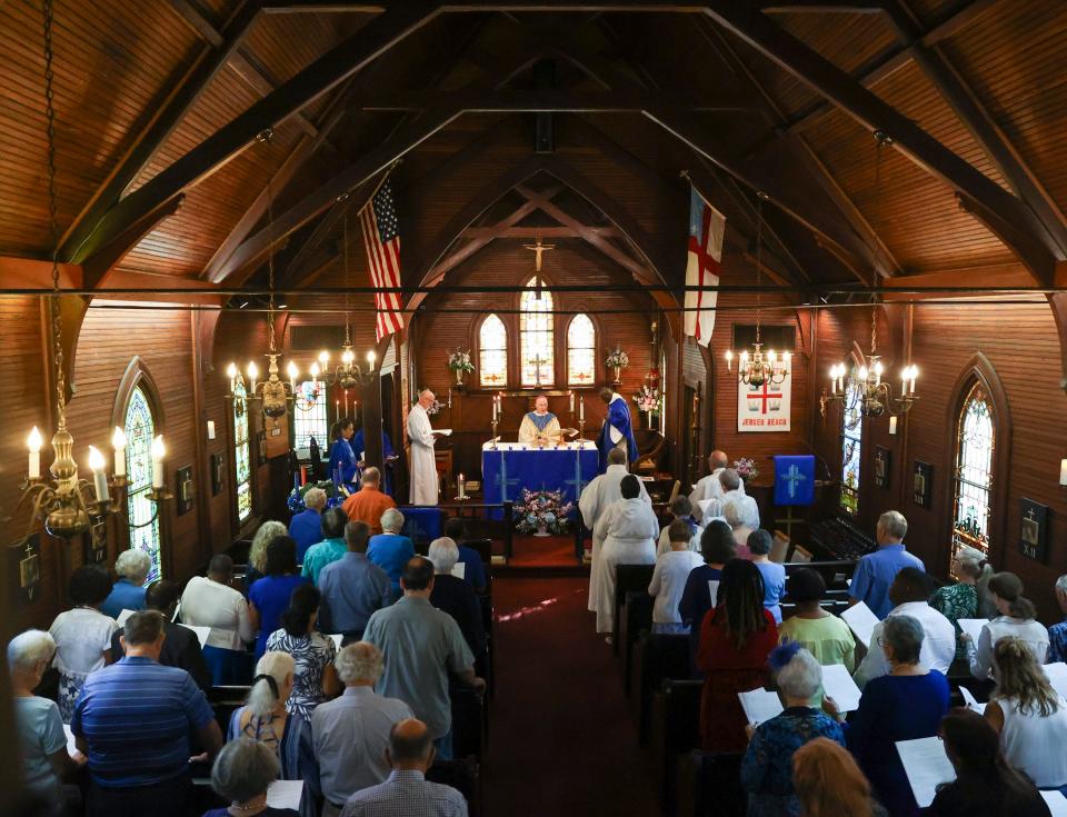 The Right Rev. Peter Eaton, bishop of Southeast Florida, leads the All Saints' Episcopal Church's 125th Anniversary service on the First Sunday of Advent, Dec. 3, 2023, at 2303 NE Seaview Dr. in Jensen Beach. The church is older than Martin County, which was founded in 1925. The first cornerstone of the All Saints' Episcopal Church was laid on Dec. 5 1898 and the earliest documented dates of the congregation gathering without a building are in 1894.