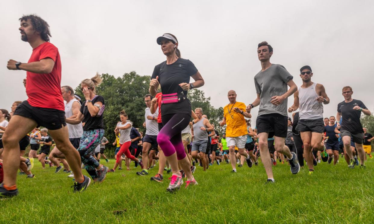 <span>Participants in a Parkrun, where many thousands of people of all levels of fitness can walk, jog or run 5km together.</span><span>Photograph: Jon Santa Cruz/Rex/Shutterstock</span>