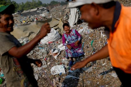 The Wider Image: Cash for trash: Indonesia village banks on waste recycling