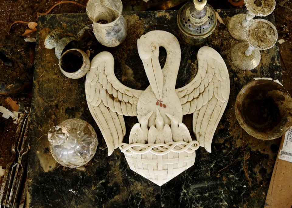 The pelican in her piety seal lies at the altar at the Sacred Heart of Jesus in Creole, Louisiana.